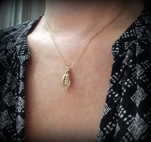 14k Solid gold Firefly on Gold Chain, set with an Opal